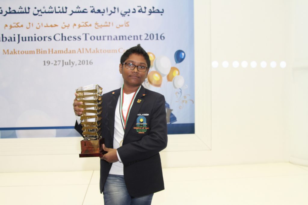 FM Mohammad Fahad Rahman with the trophy